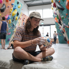 Climber using the Boulder Block at the bouldering wall